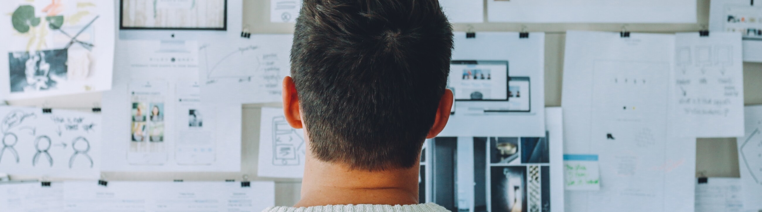 man in front of whiteboard